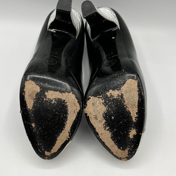 Authentic used Chanel heels size 37.5. I’m a size 6.5/7 and fits me perfectly. - Picture 5 of 8